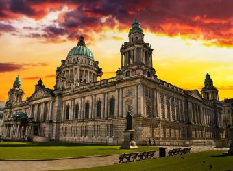 Beautiful Picture of City Hall in Belfast Northern Ireland during a colorful sunset.